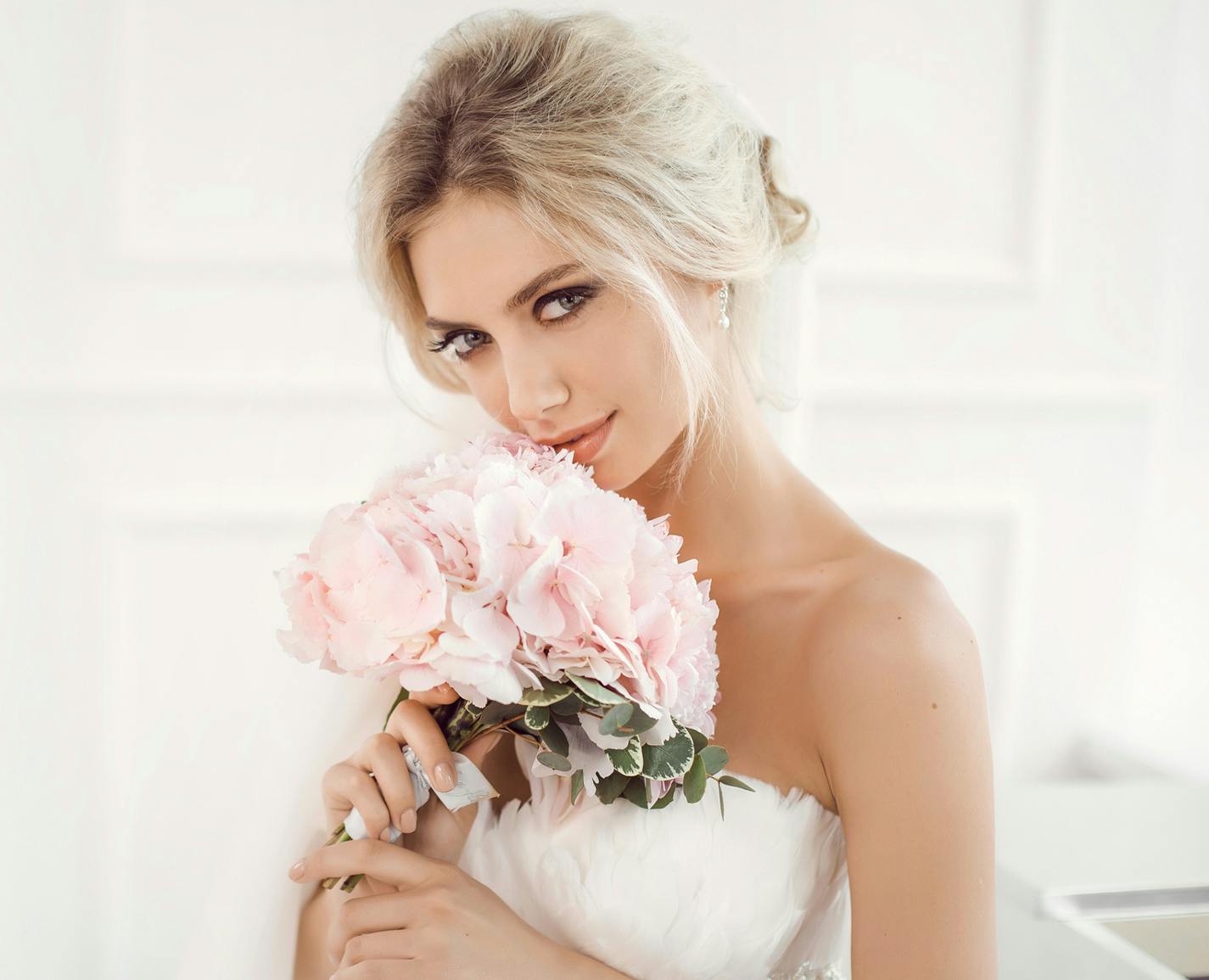 bride with a bouquet in her hands