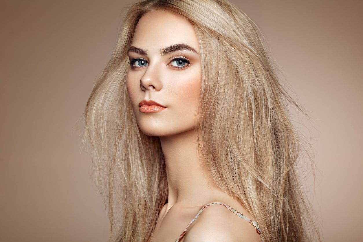 Pretty Blonde Women With Serious Expression