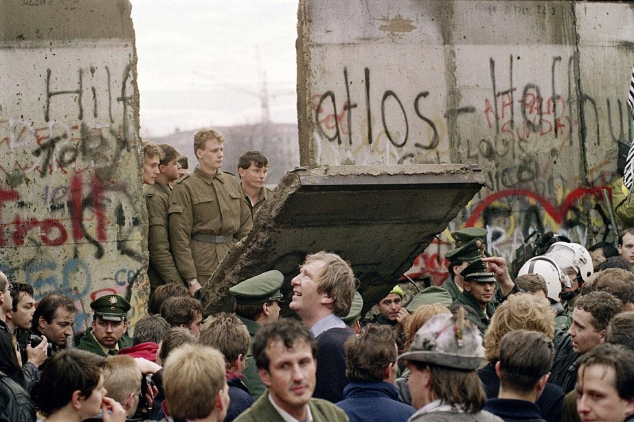 Fall of the Berlin Wall on November 9, 1989, this event will lead to the unification of Germany.