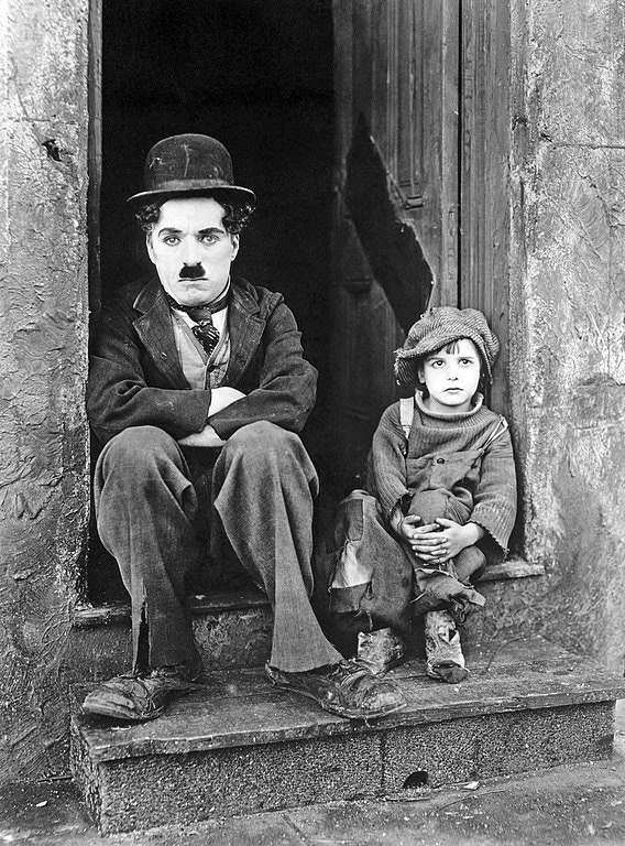 Release of Charlie Chaplin's first feature film, The Kid, on January 21, 1921
