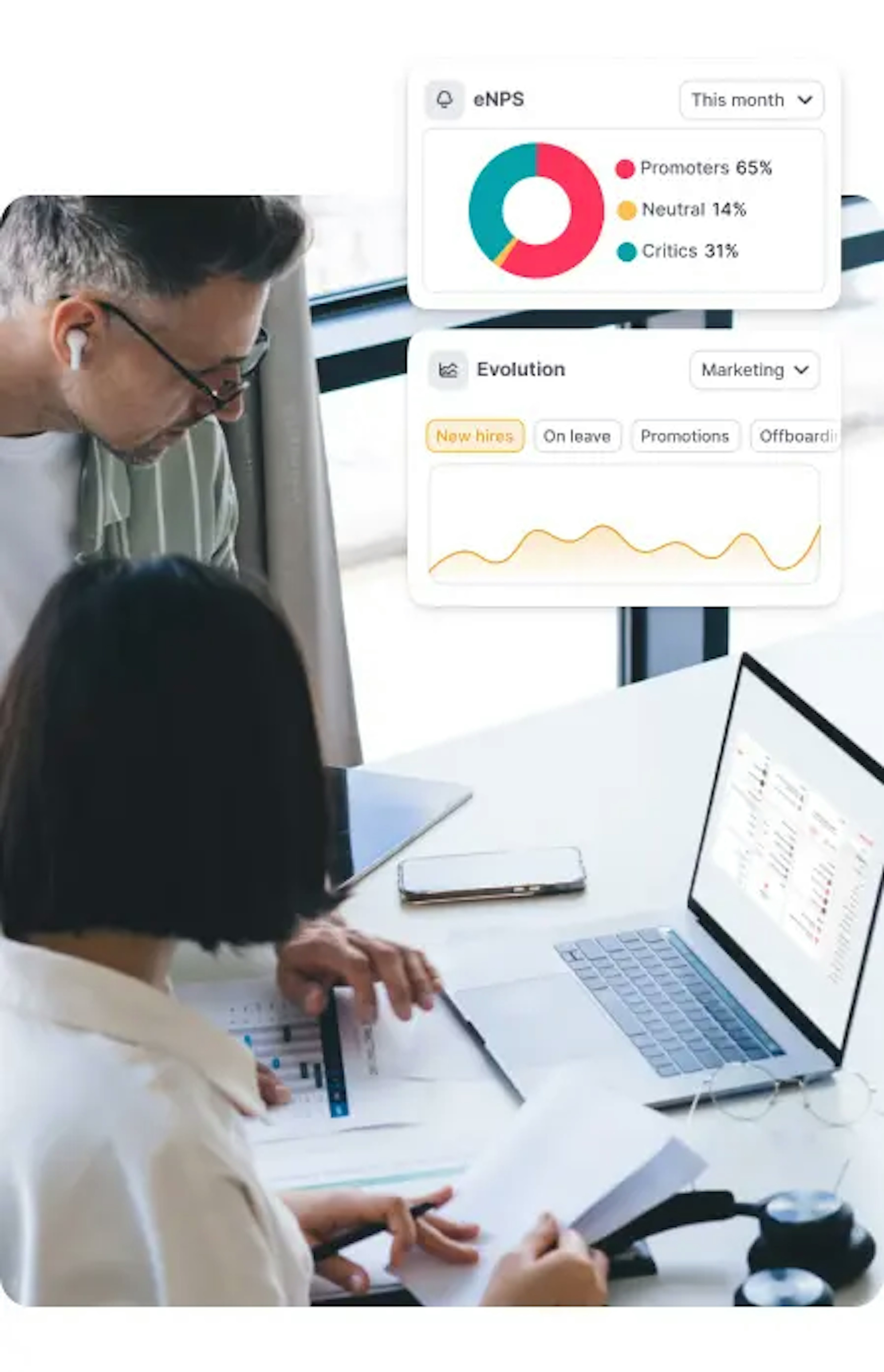 Colleagues using HR software on a laptop
