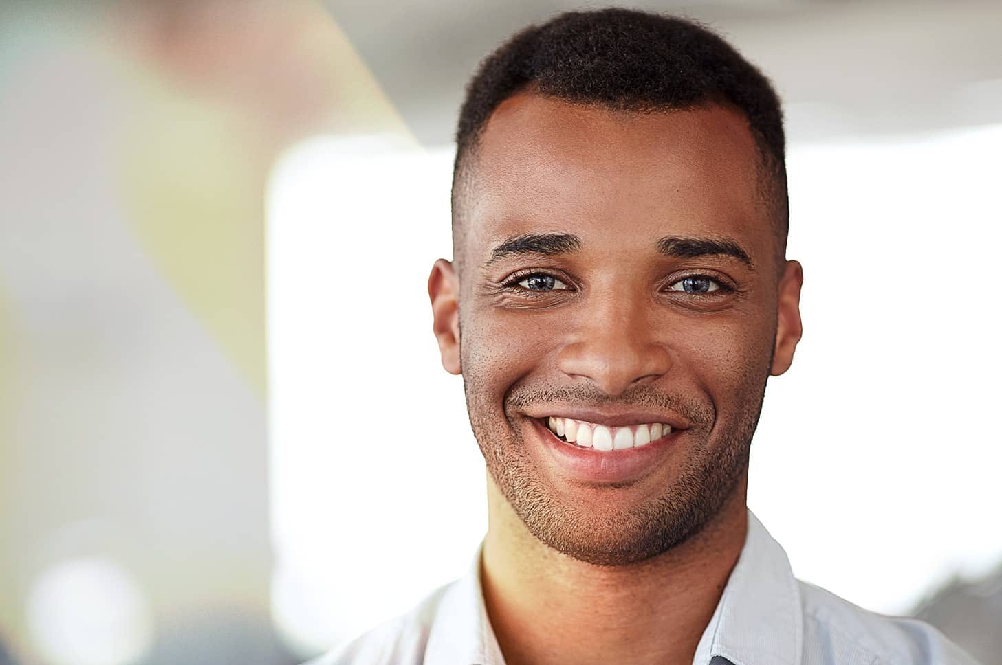 man looking into the camera and smiling