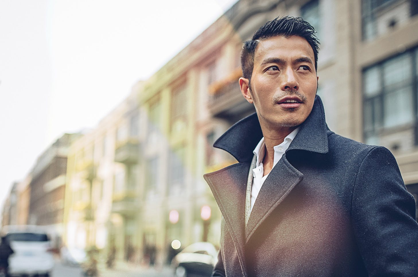 Man on the street looking sideways