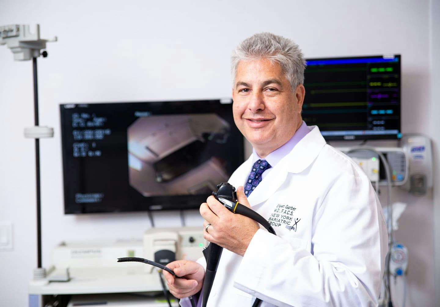 Doctor holding a medical device