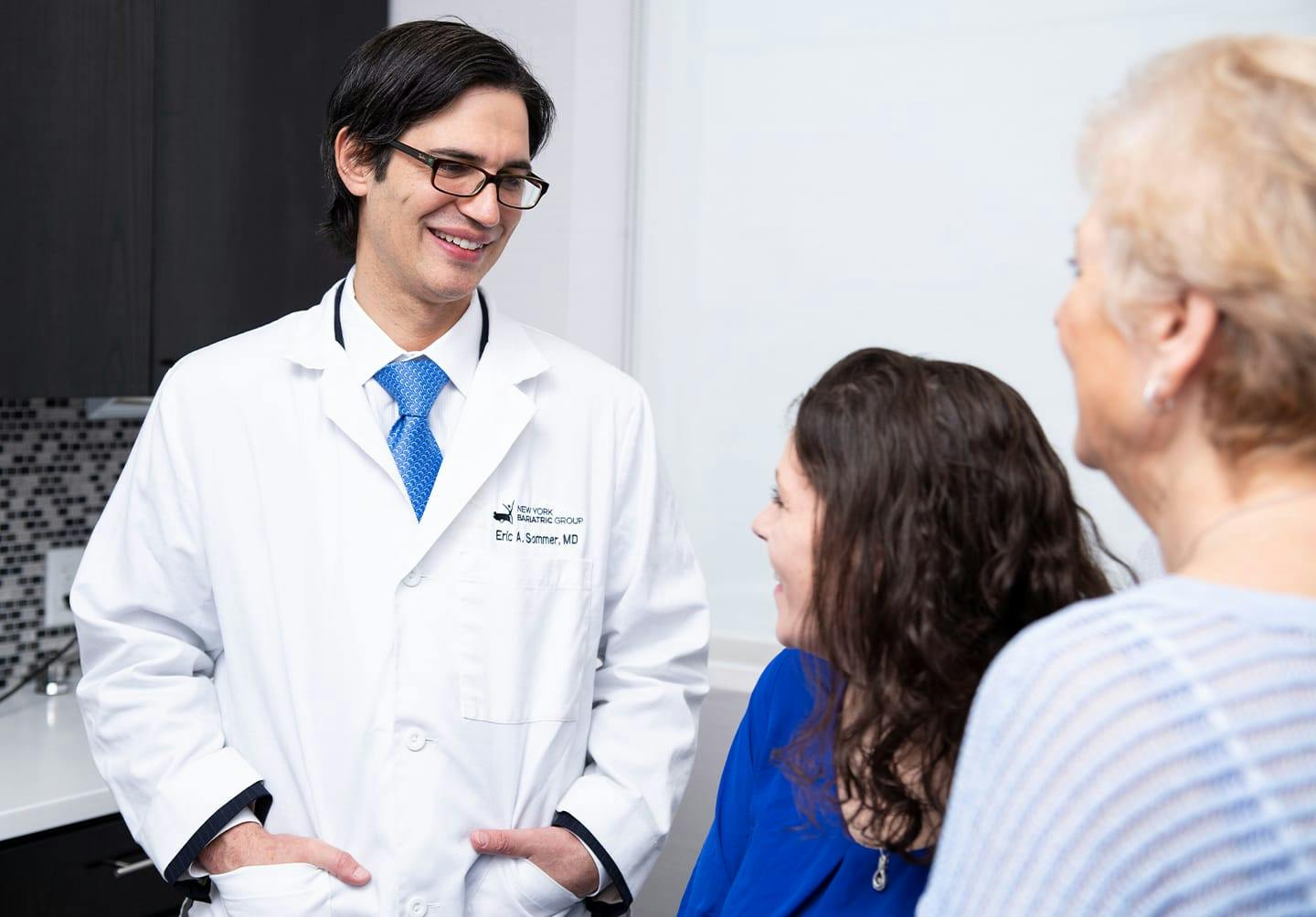 Doctor talking to woman