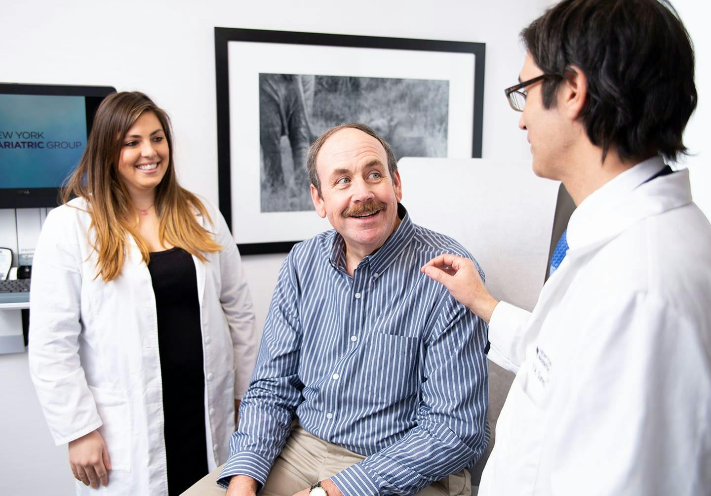 Man speaking to doctors