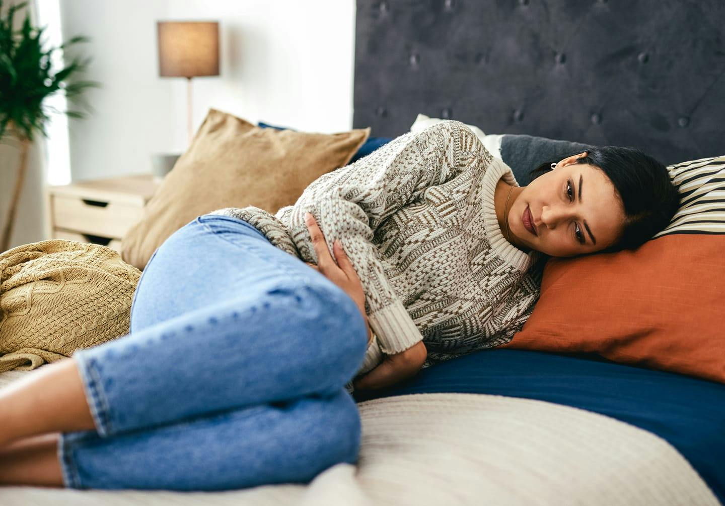 Woman holding her stomach