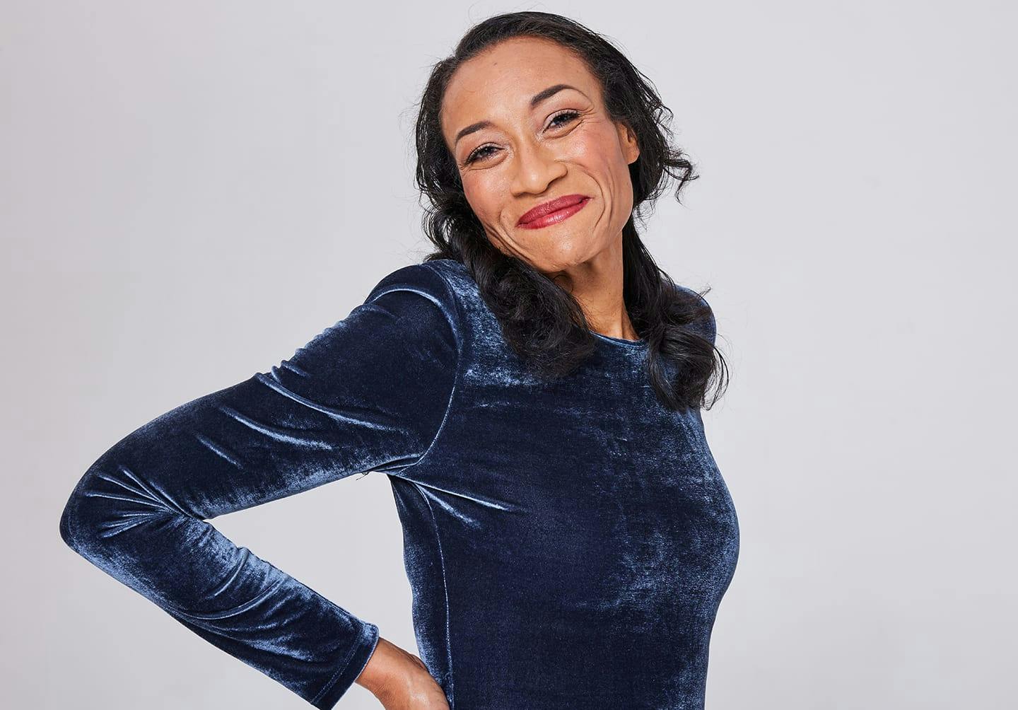 Woman wearing a velvet blue top