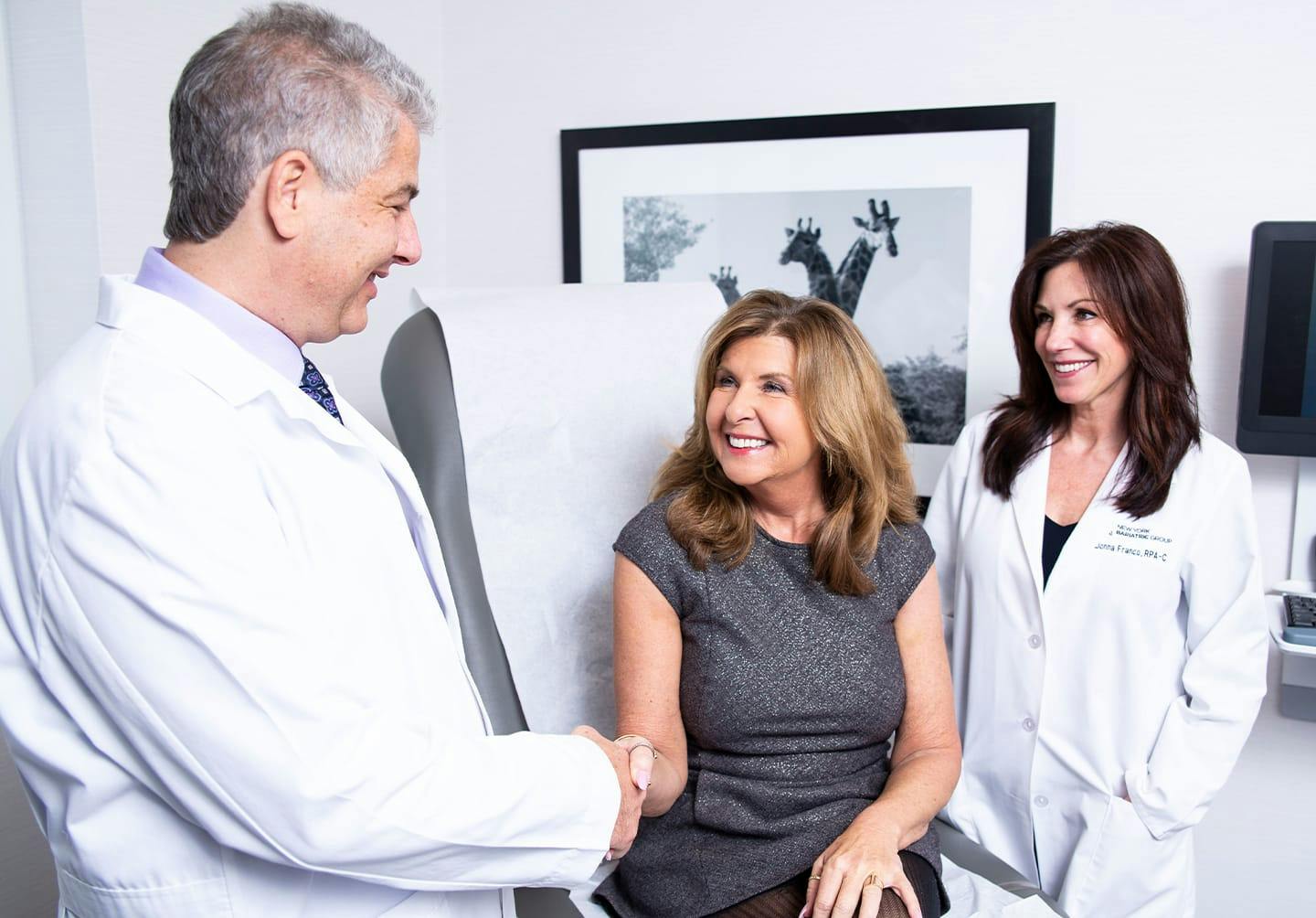 Woman shaking doctor's hand