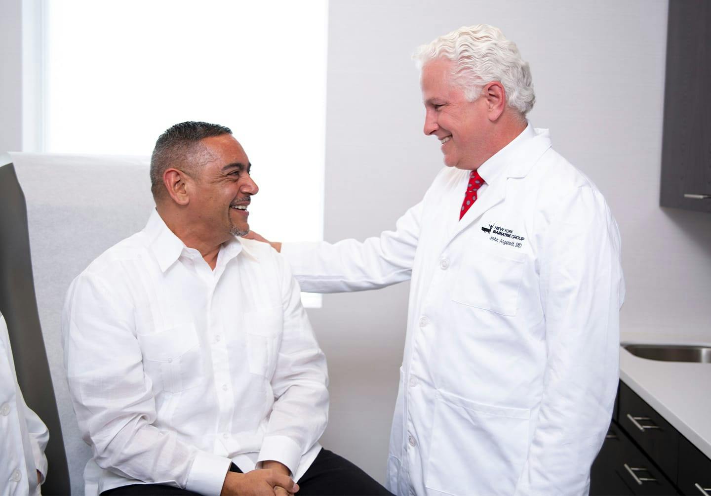 Man talking to doctor