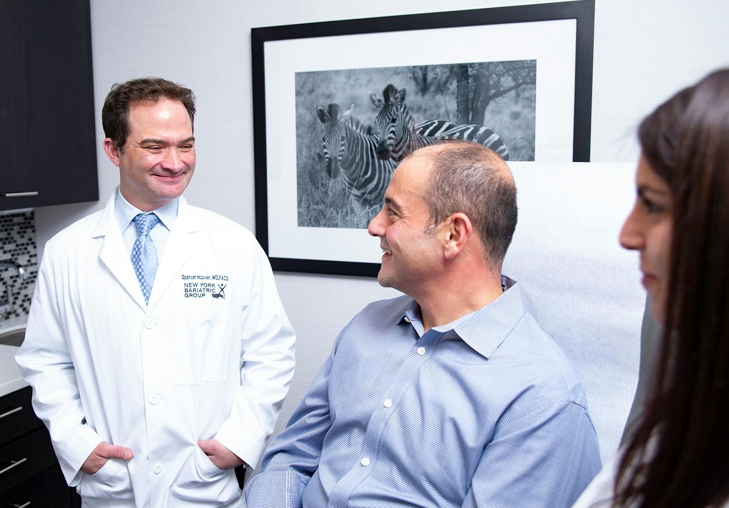 Man speaking to doctors
