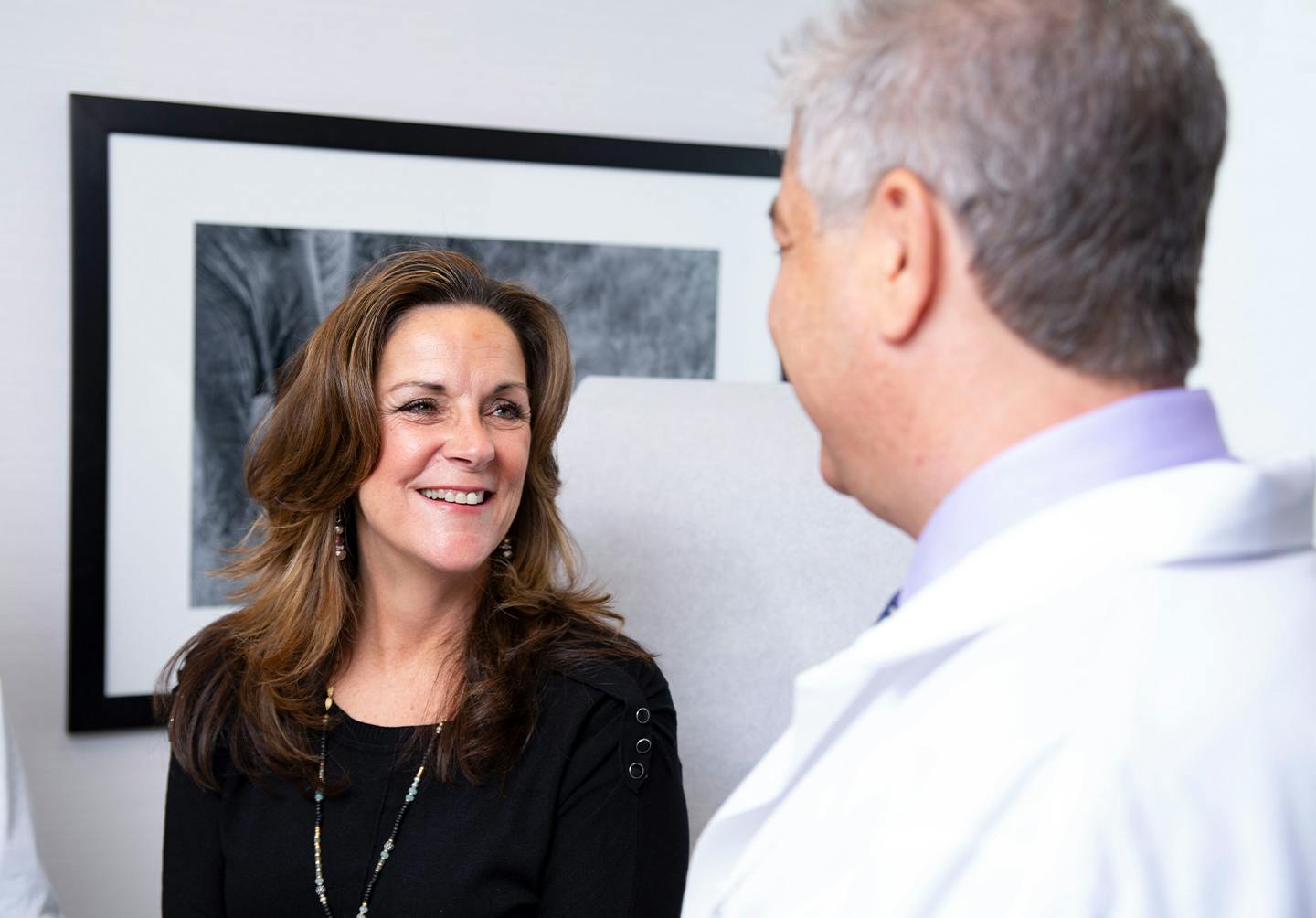 Woman and doctor talking