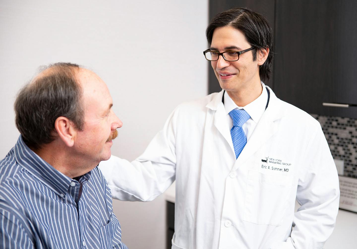 Man talking to doctor