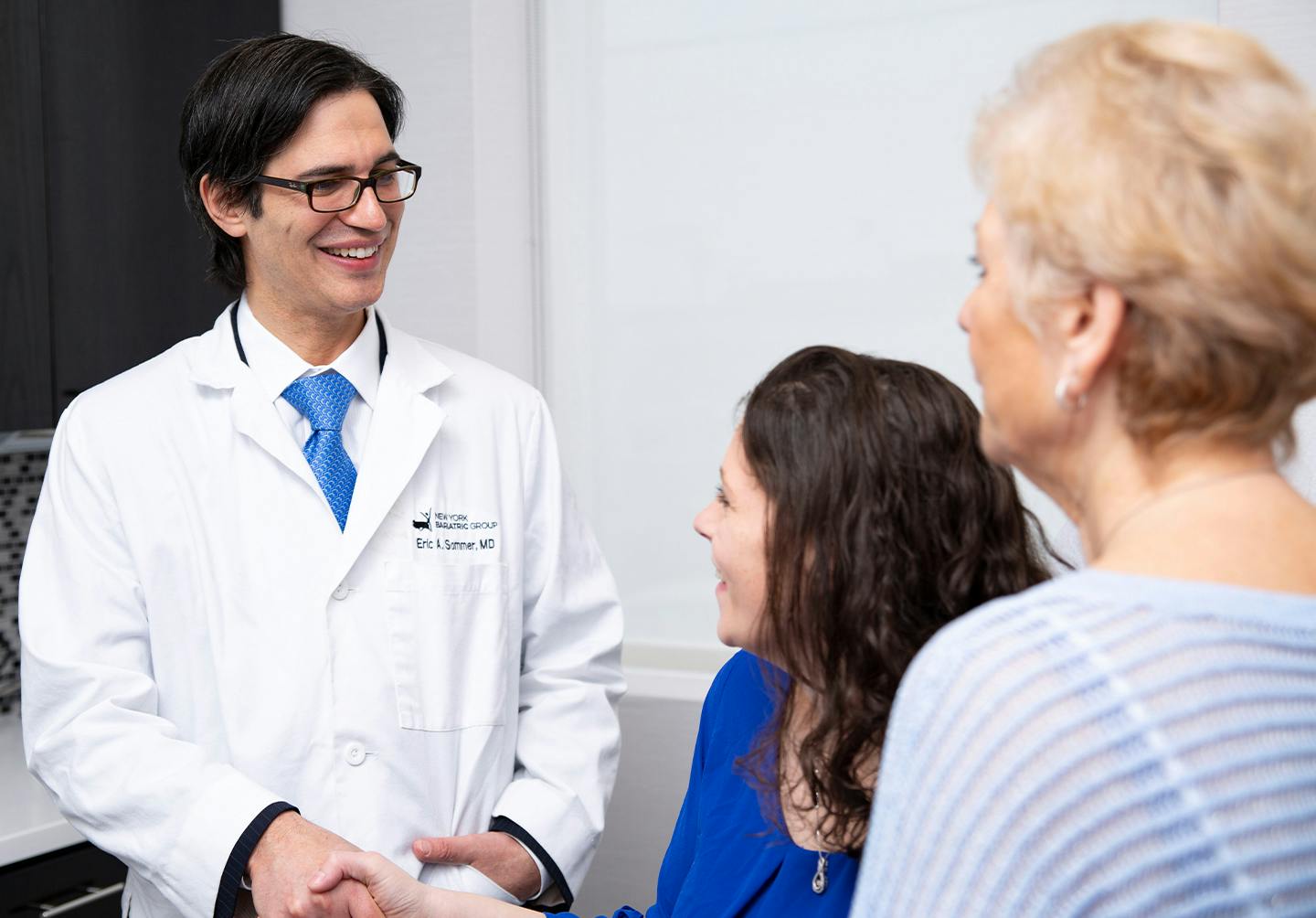 Doctor talking to woman