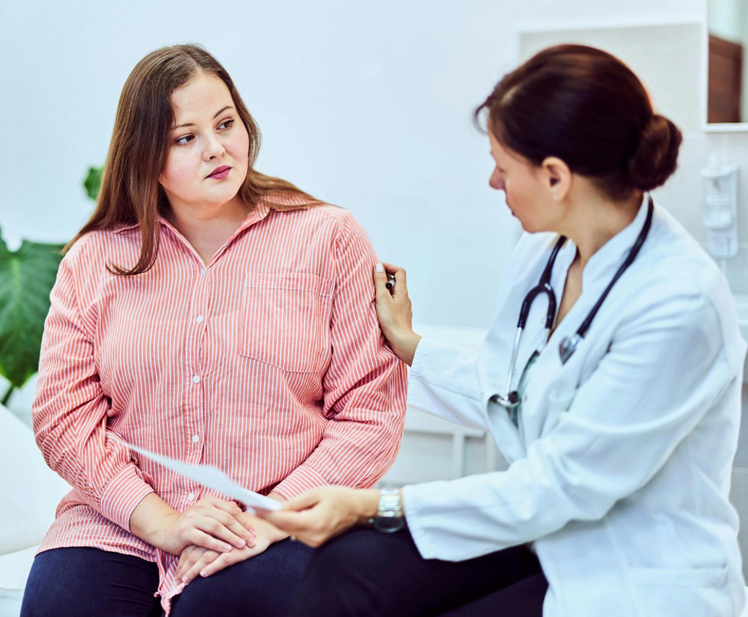 Doctor speaking with patient