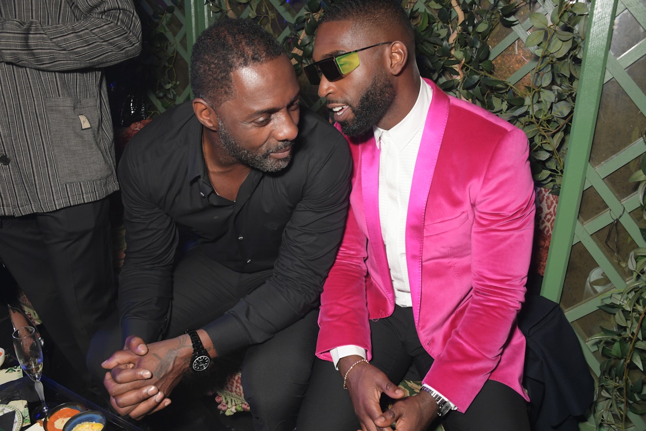 Idris Elba & Tinie Tempah, having a conversation at an Annabel's event