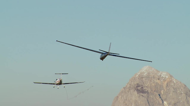 Hang Glider Touches Down On Sail Plane  W Matjaz Klemencic