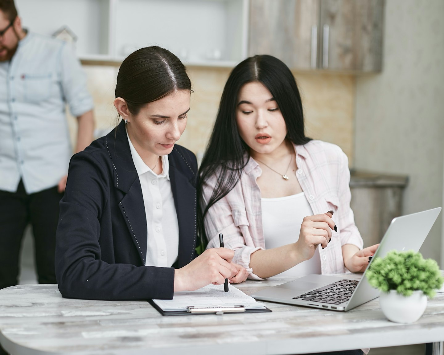 two business women working