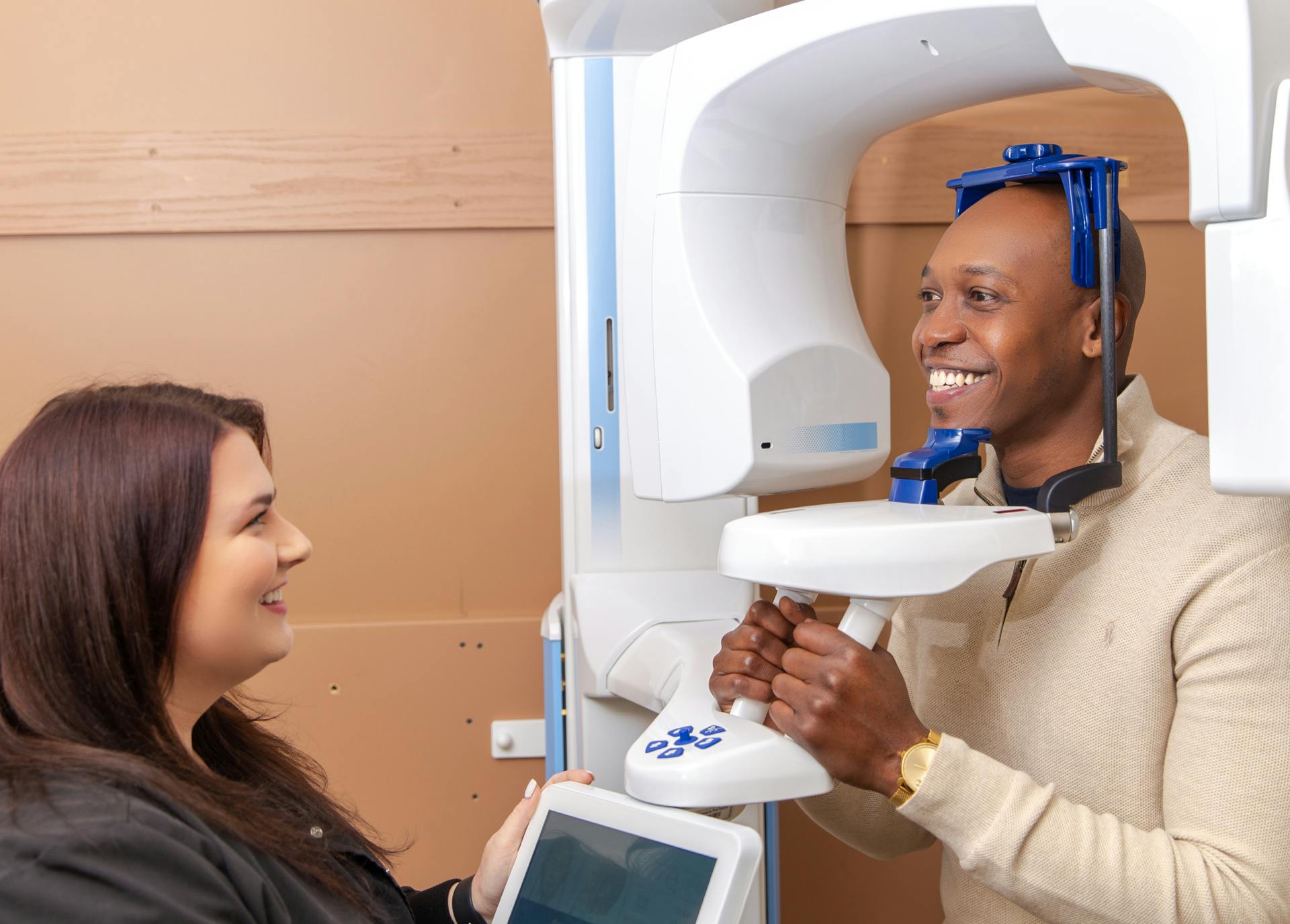Dental hygienist with patient at Admira Dentistry