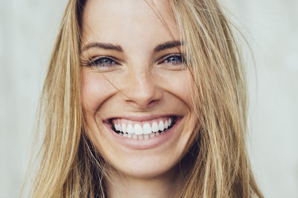 Blonde woman with beautiful smile