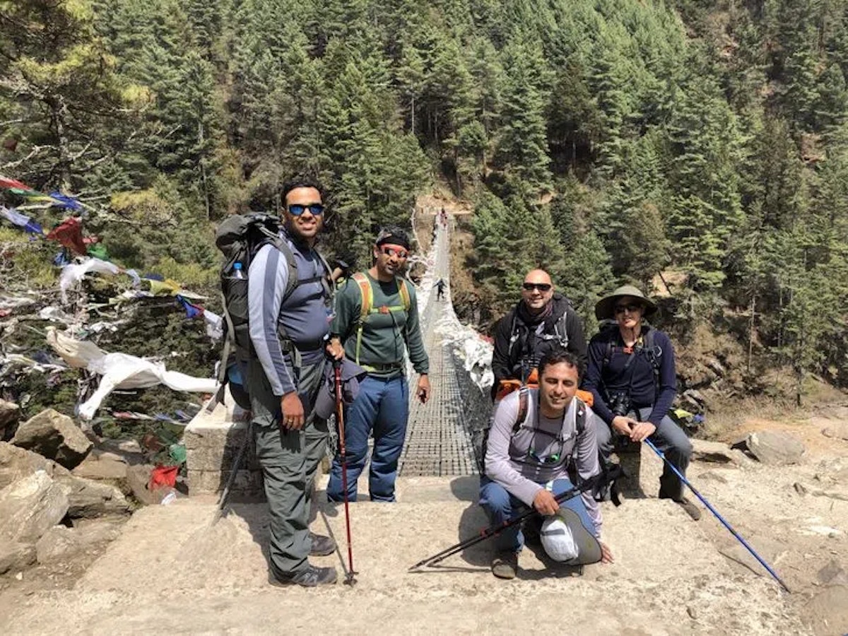 the team after crossing the bridge - on the edge of a cliff