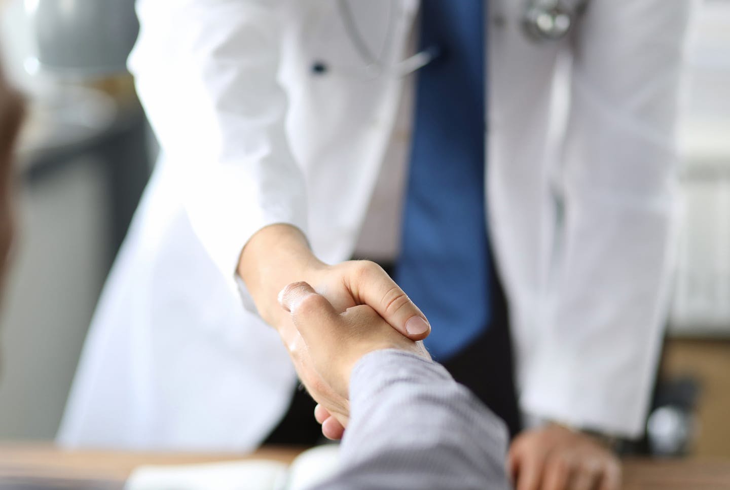 two people shaking hands