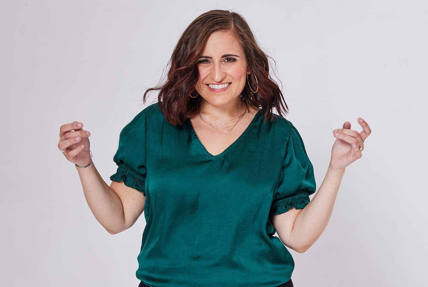 woman in green satin top