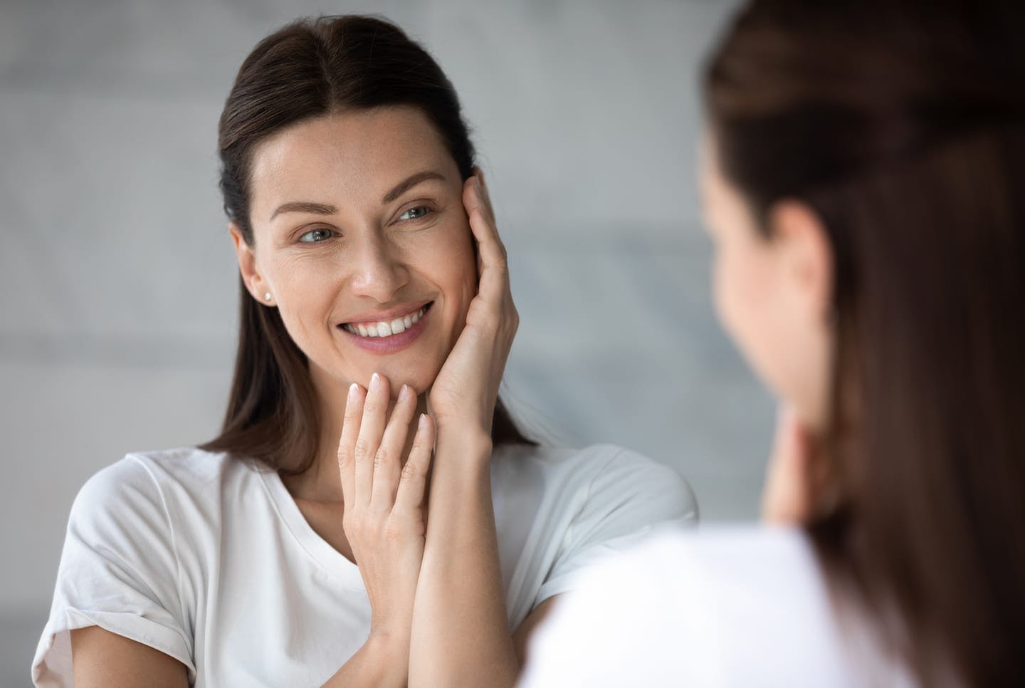 woman caressing face