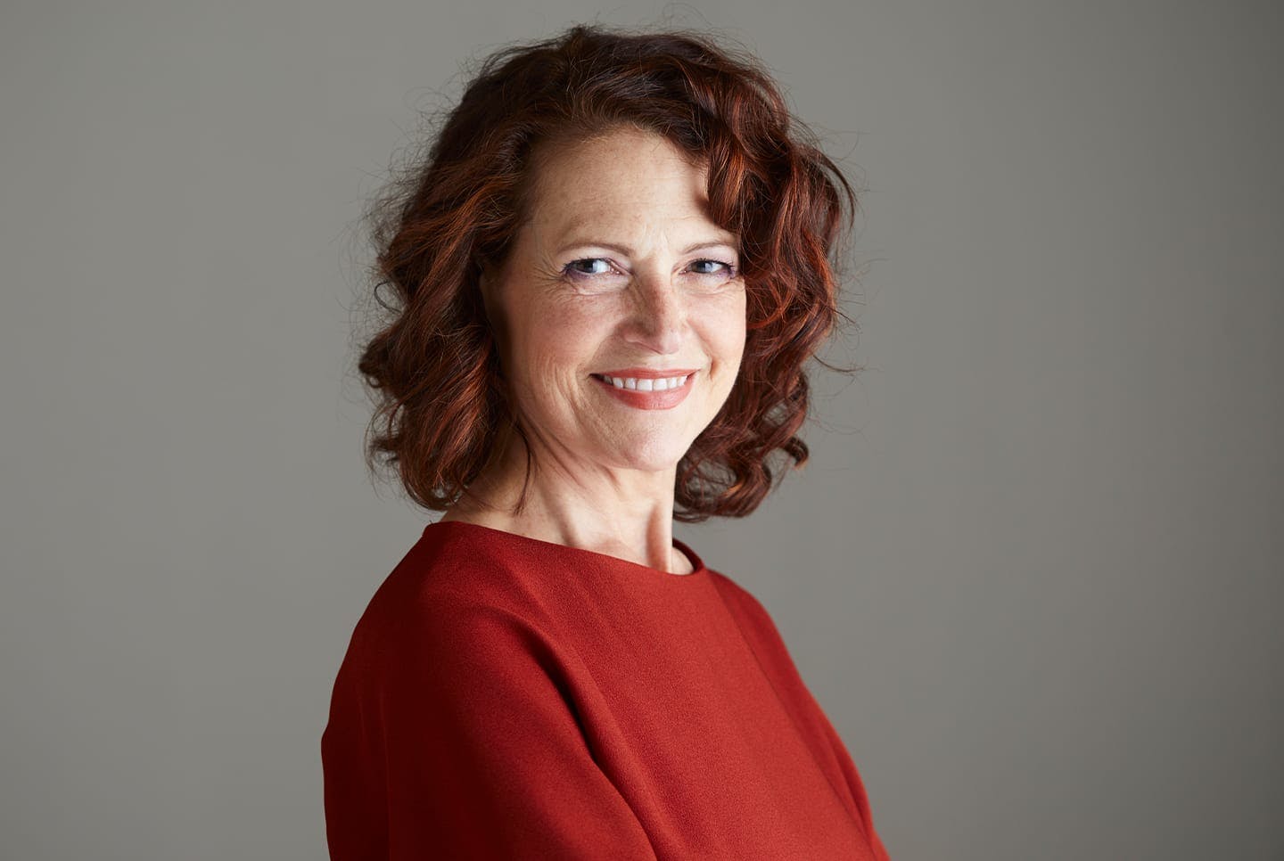 woman in red sweater