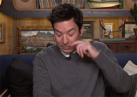 Jimmy Fallon wipes away fake tears as the words 'gone, but not forgotten' flashes across the screen.