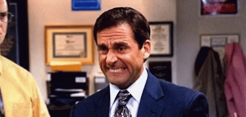 Michael Scott, a character from the US office, bites his lip nervously.