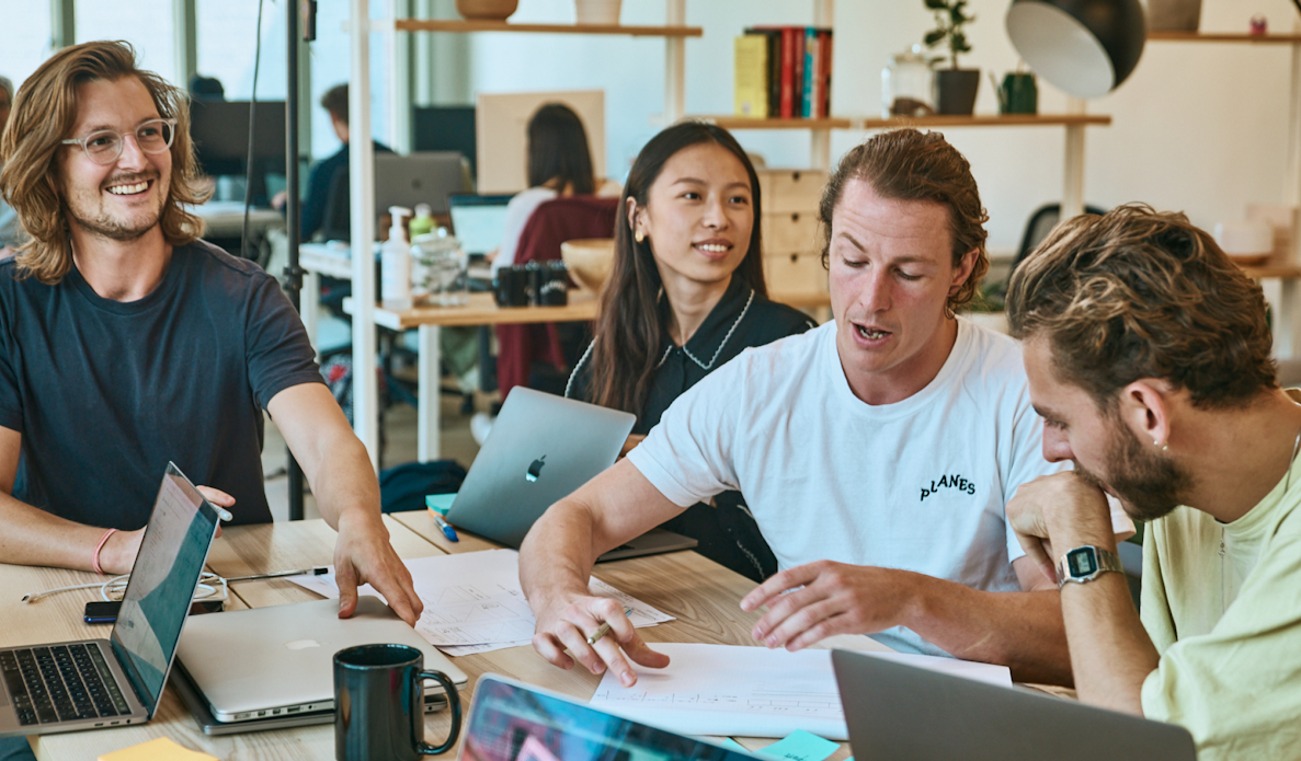 Founders CJ & Ryan are sat around a table running a workshop