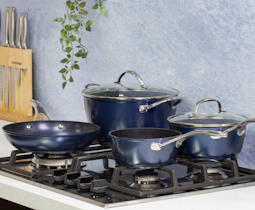 blackmoor blue pro range of non stick cookware on a hob