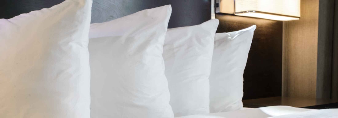 How Many Pillows Should You Sleep With?