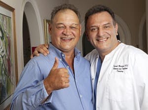 Ed O' Ross with Dr. Maddhi, giving thumbs up