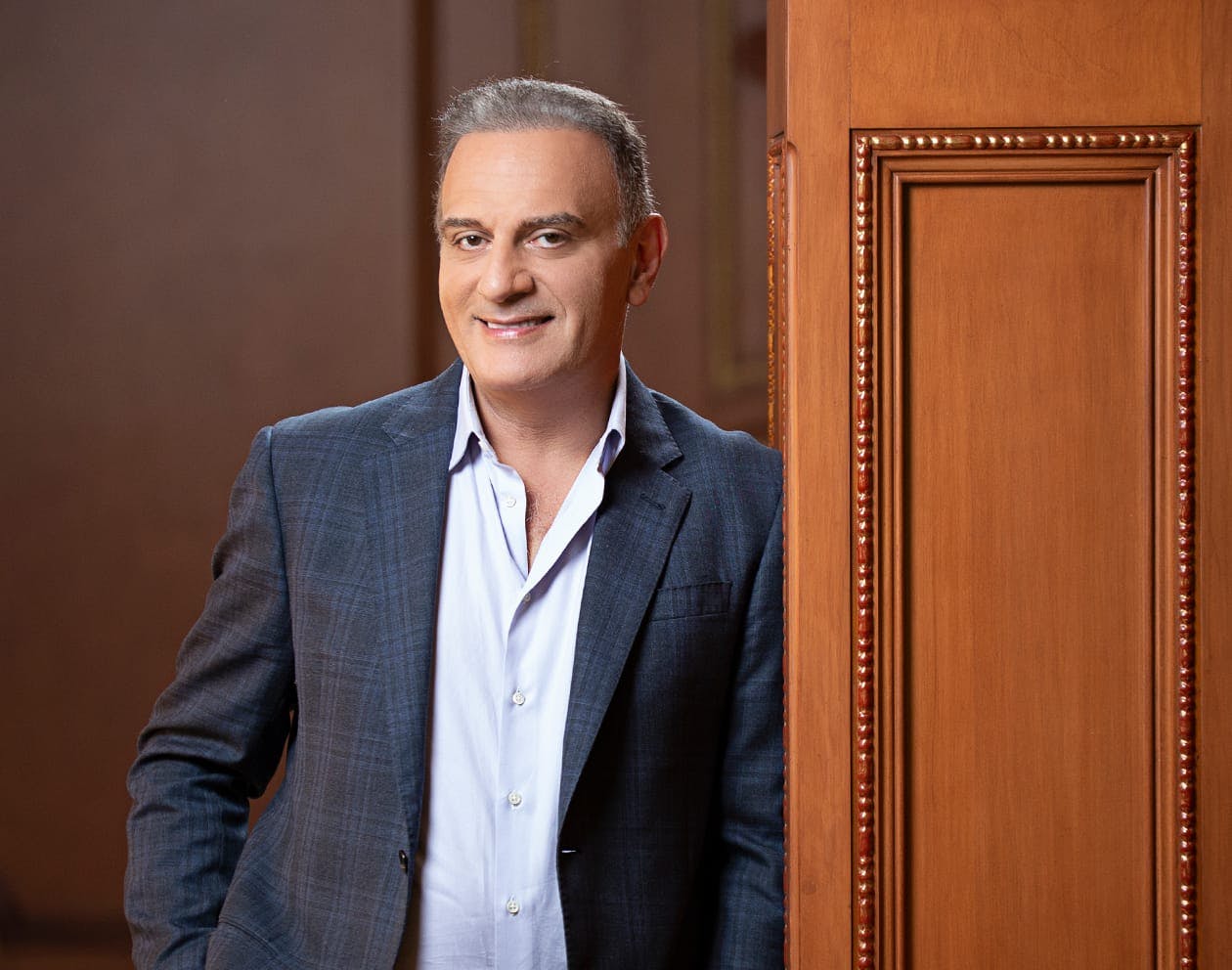 a photo of Dr. Maddahi standing by a doorframe