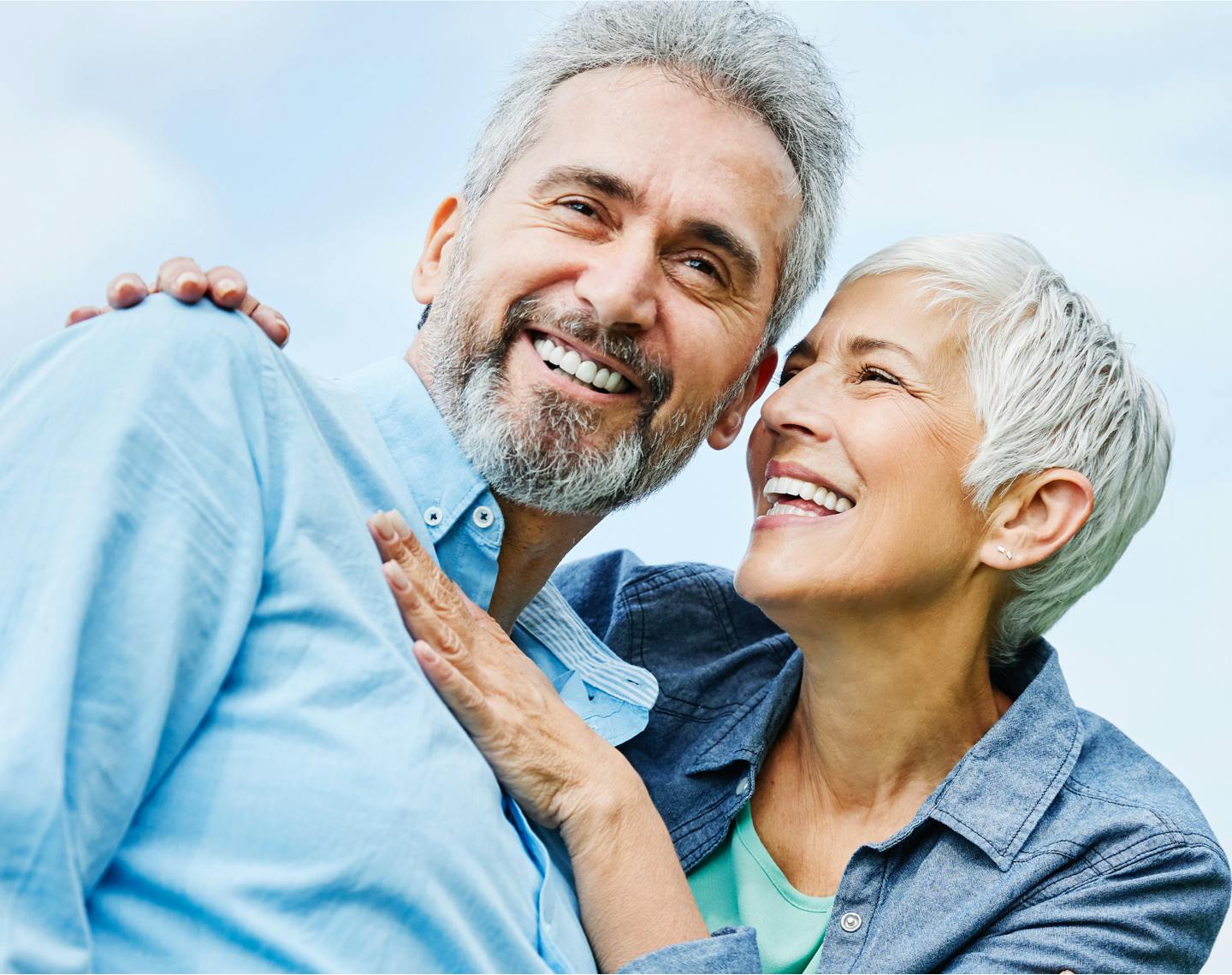 Older man and woman smiling