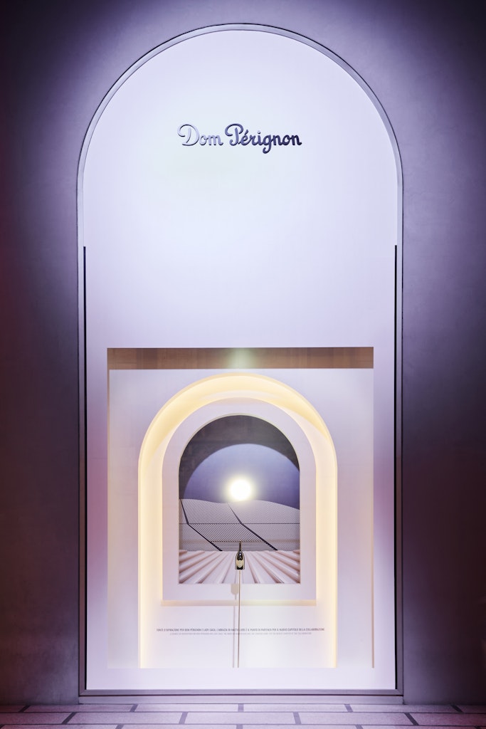 A theatrical storefront display at La Rinascente for Lady Gaga x Dom Pérignon  