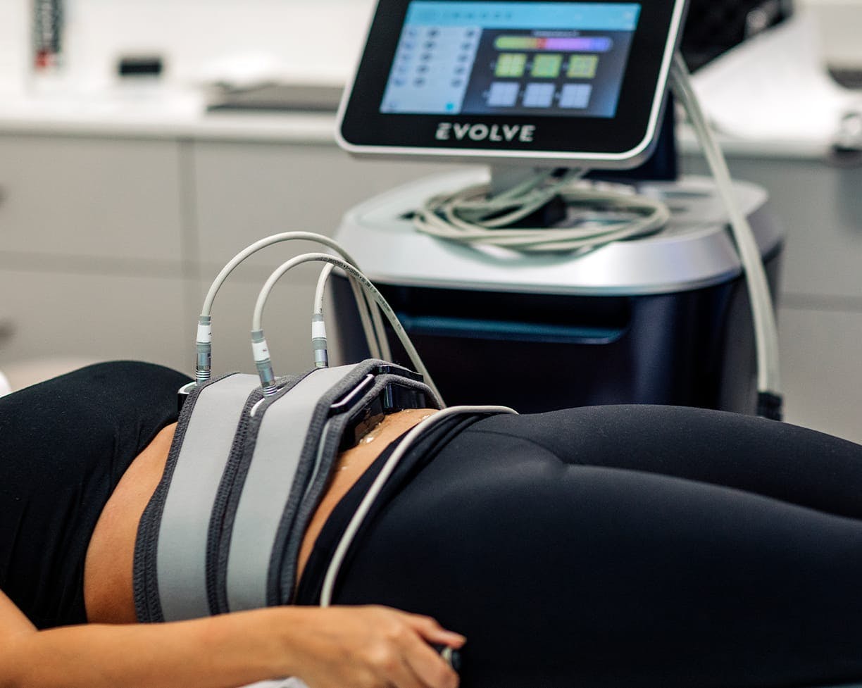a patient receiving an evolve body contouring treatment