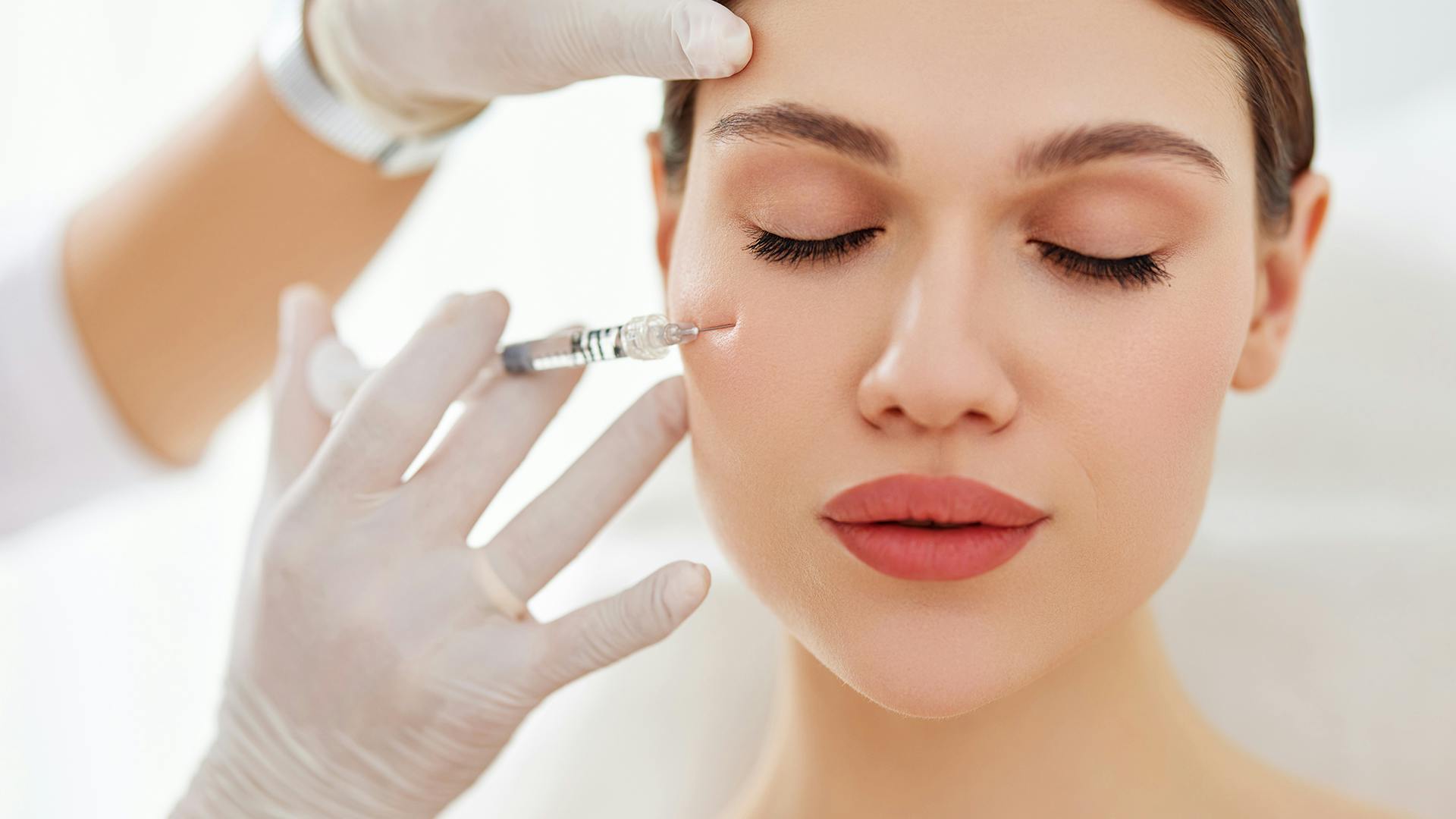 an image of a patient receiving a botox treatment
