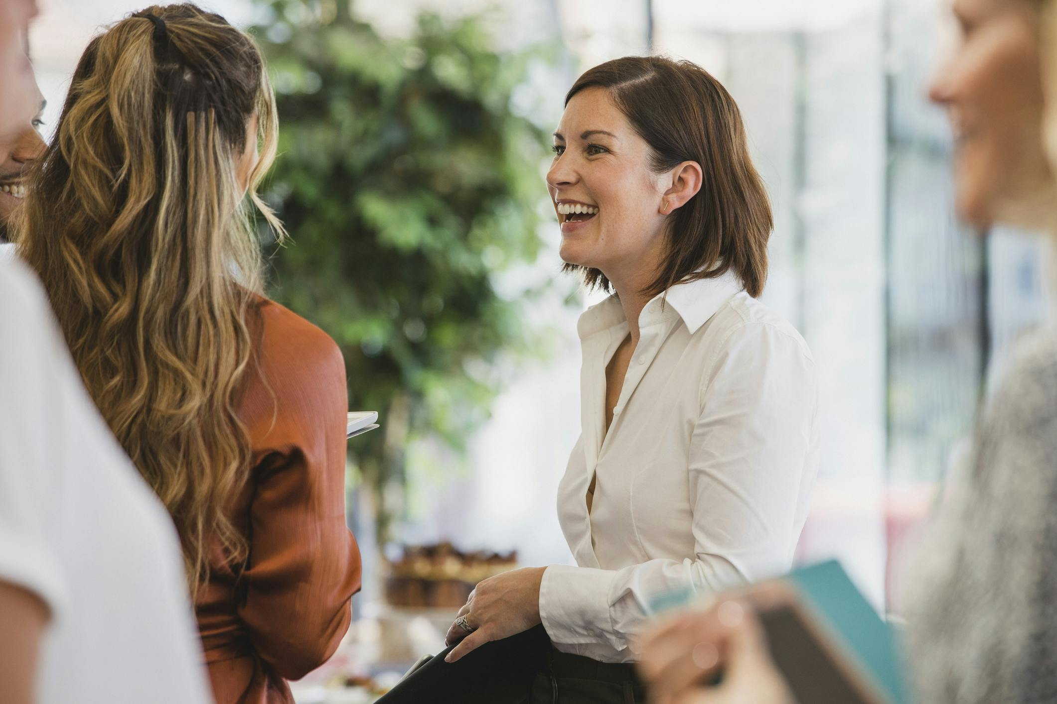 Women speaking at a party