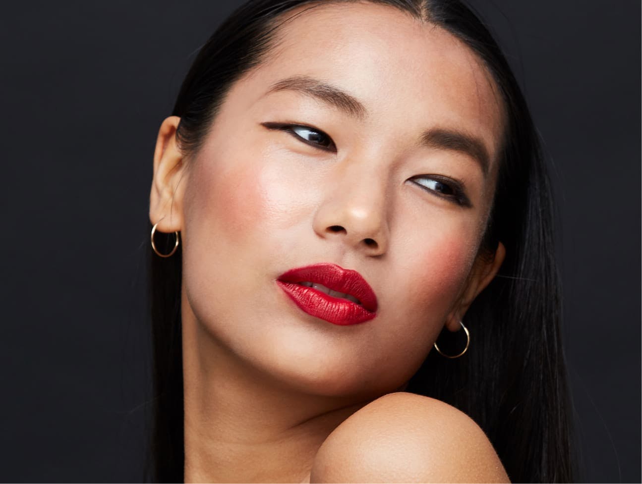 Woman wearing bright red lipstick