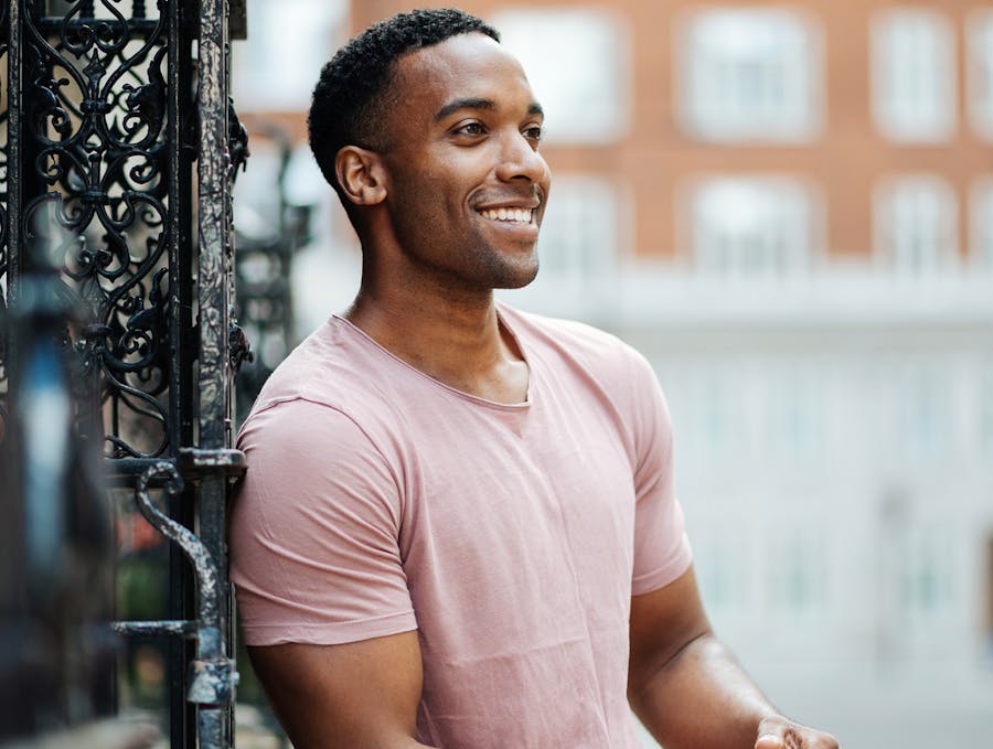 Man wearing a pink shirt