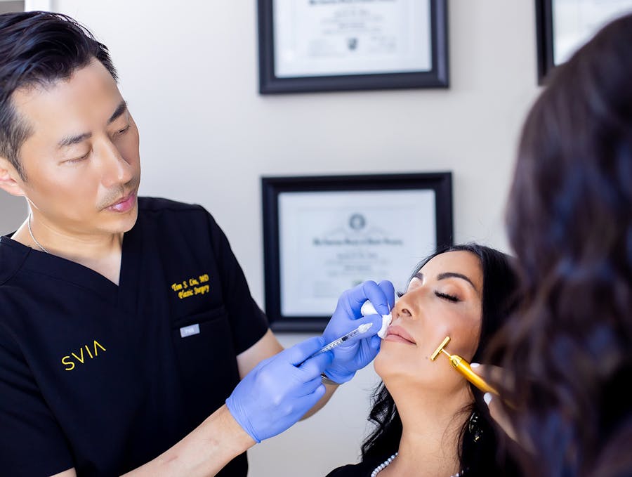 Woman receiving injectable treatment