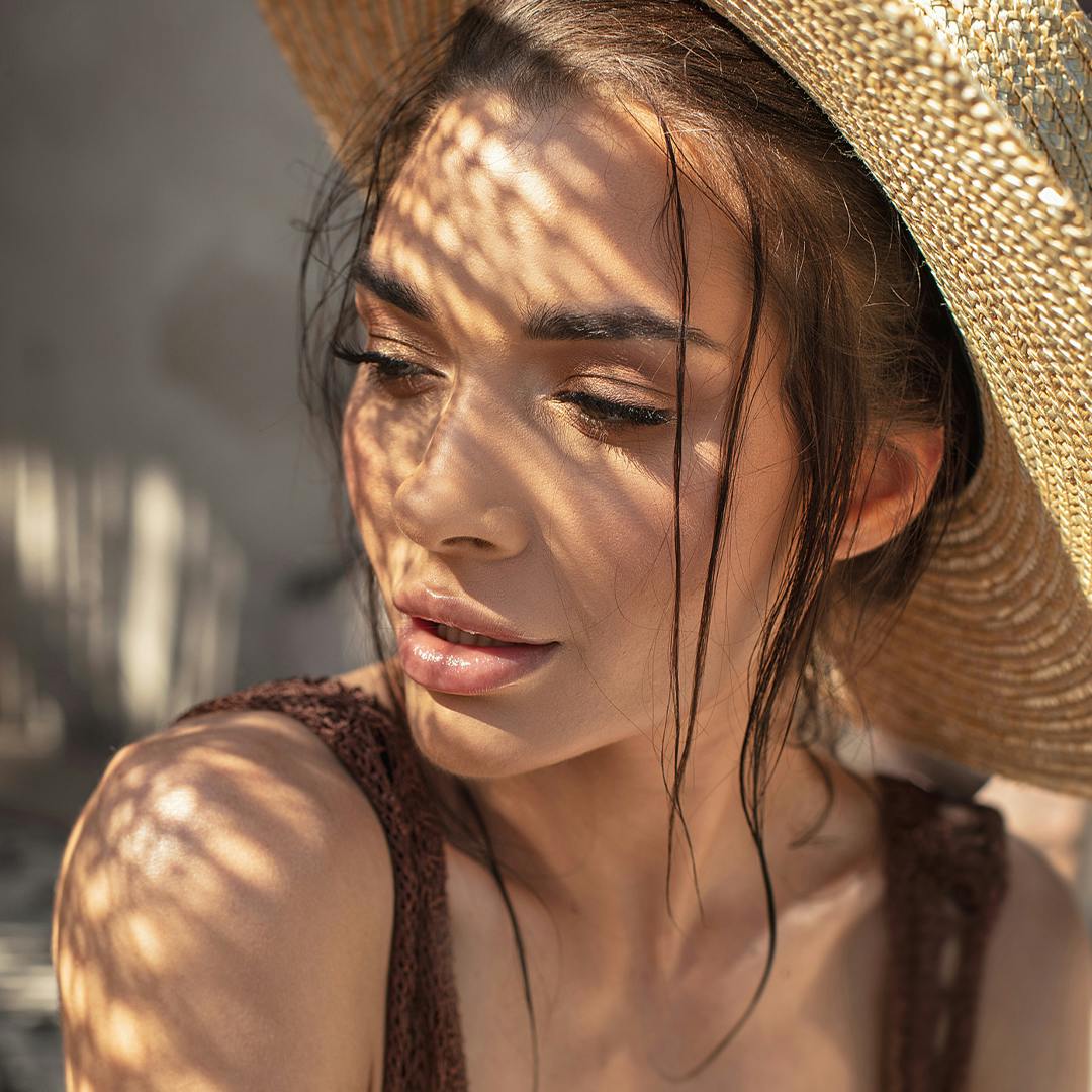 Woman wearing a sunhat