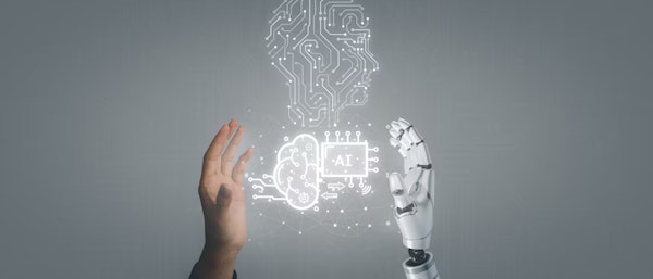 Een hand tegenover een robothand met daar tussen een illustratie van hoofd bestaande uit een computernetwerk.