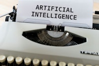 Een typemachine met de tekst: artificial intelligence