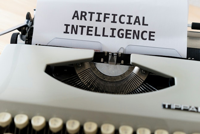 Een typemachine met de tekst: artificial intelligence