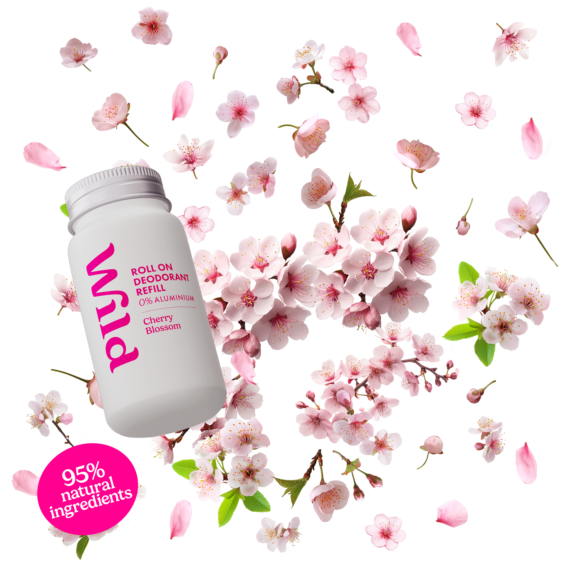 Caption: a bottle of vitamin water surrounded by pink flowers