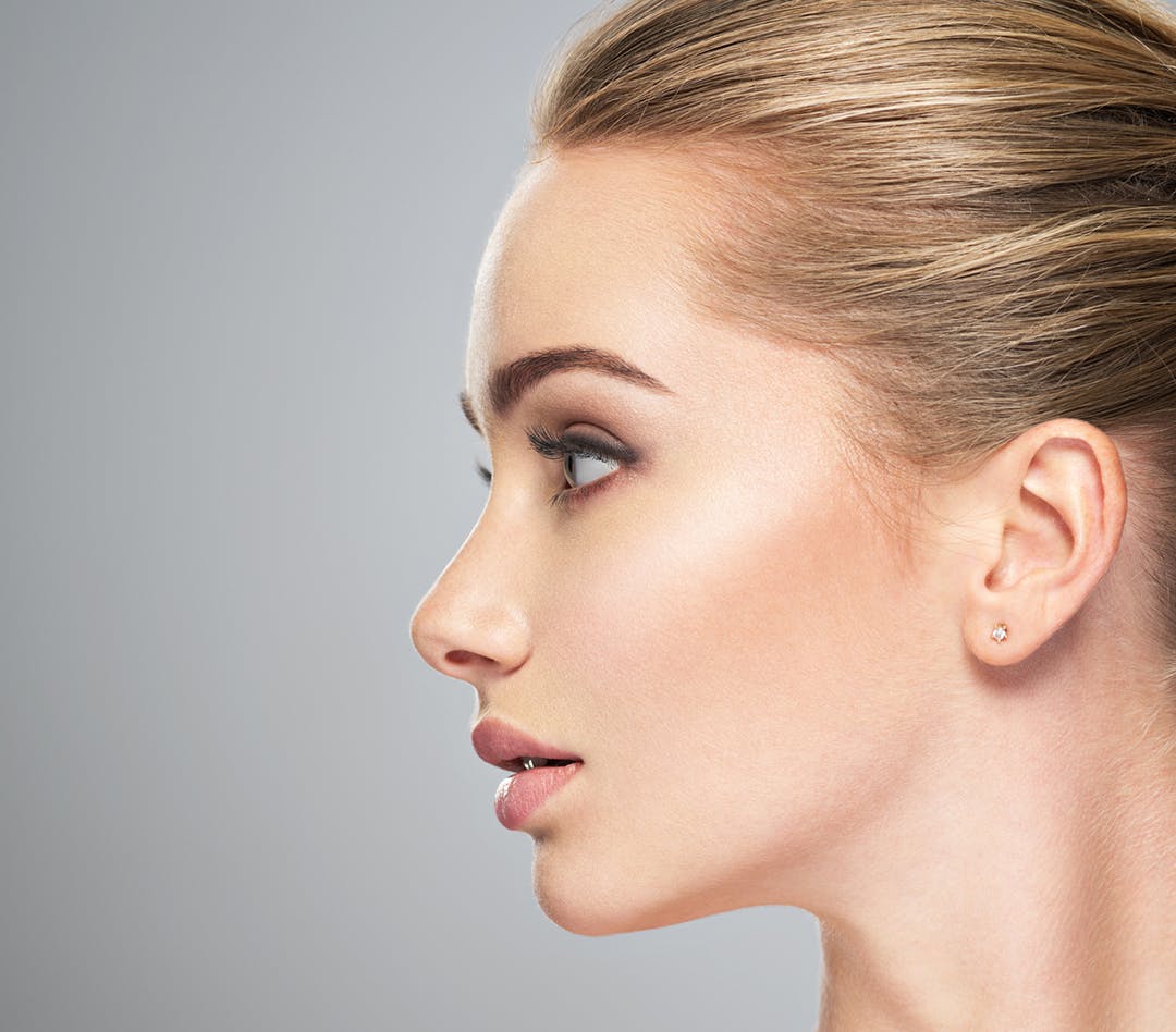 The side of a blonde woman's face